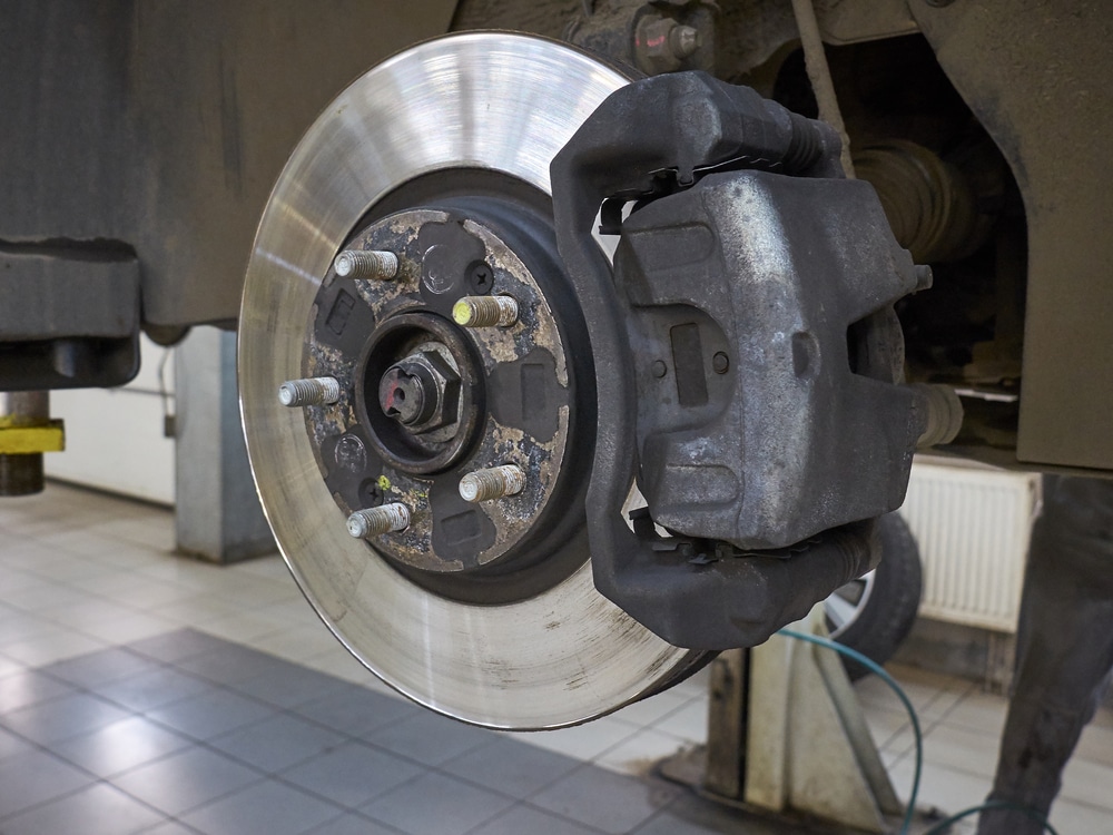 Close up view on used car brake disk